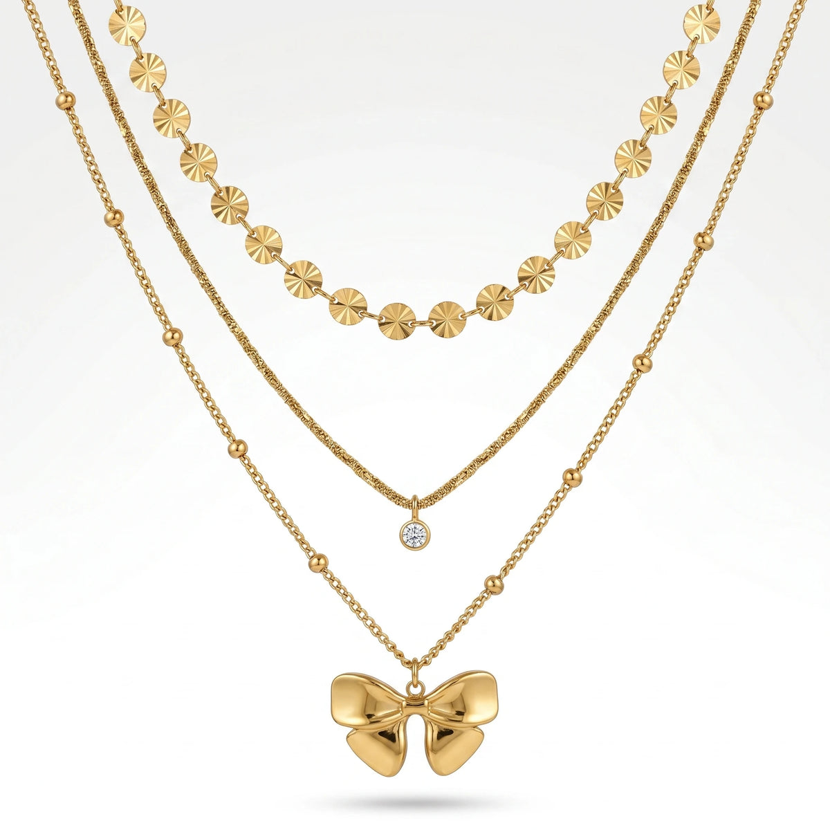 QIAOREN 12139 Ins Dainty Three Layer Stainless Steel Choker Gold Bow Charm Round Zircon & Textured Disc Chain Ladies Accessory
