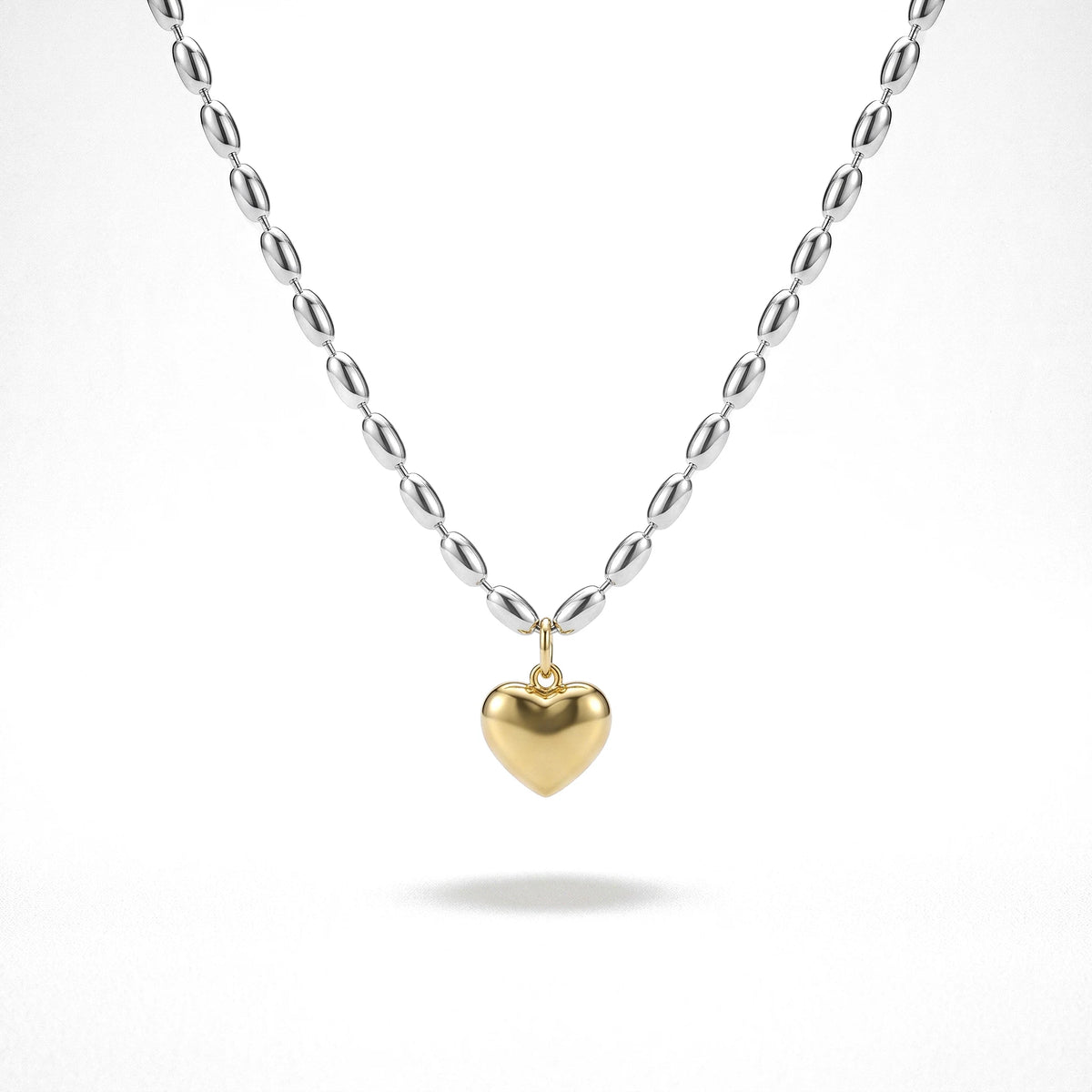 QIAOREN 13995 Two Tone Oval Rice Bead Chain Necklace with Puffy Solid Gold Heart Pendant, Silver Chain & Gold Charm Contrast