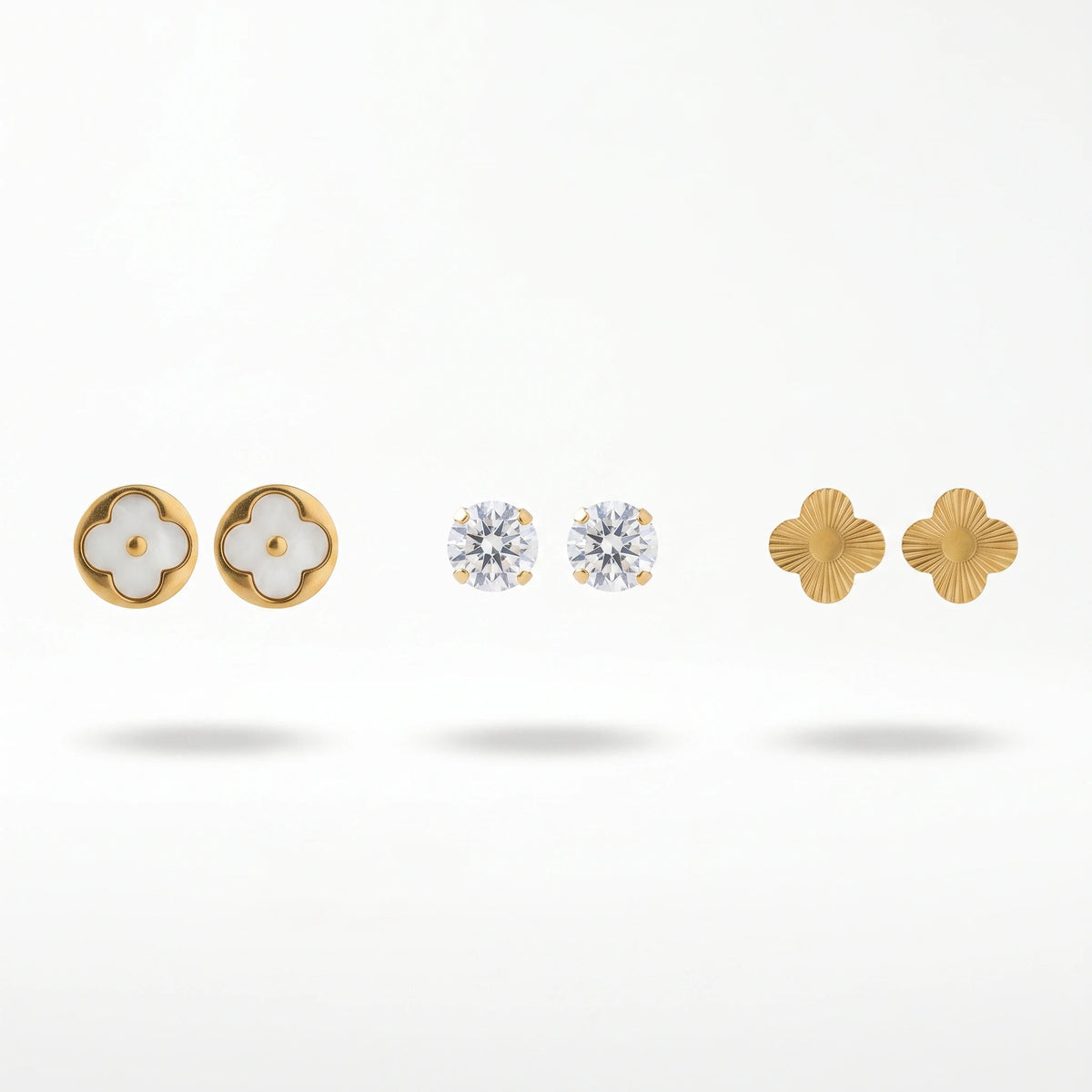 QIAOREN 14451 3 Pair Gold Stainless Steel Stud Earrings, White Quartz Clover, Round CZ & Textured Clover Studs