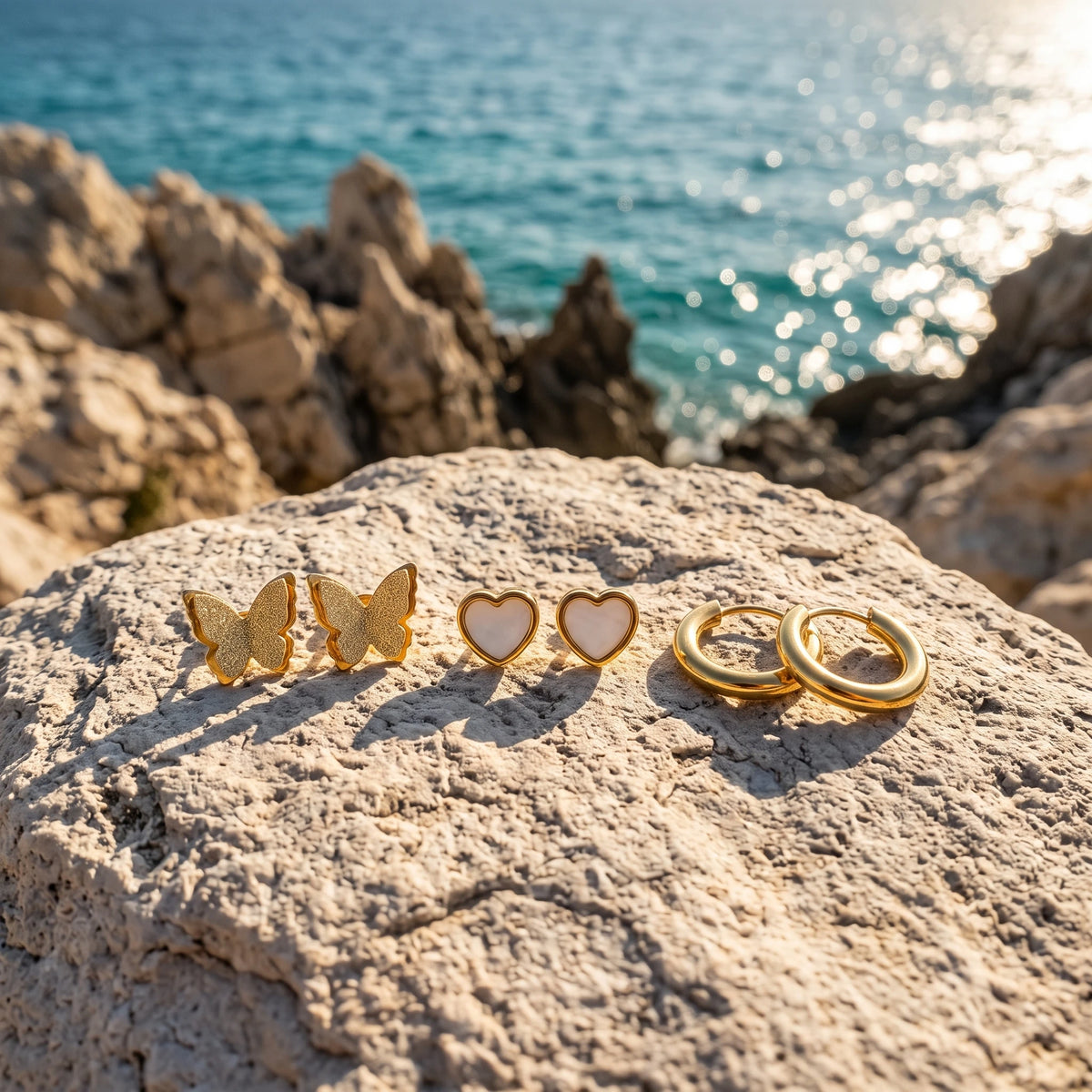 QIAOREN 14484 3 Pairs Gold Stainless Steel Earrings Set, Frosted Butterfly Studs, Shell Heart Studs & Minimalist Huggie Hoop Ear