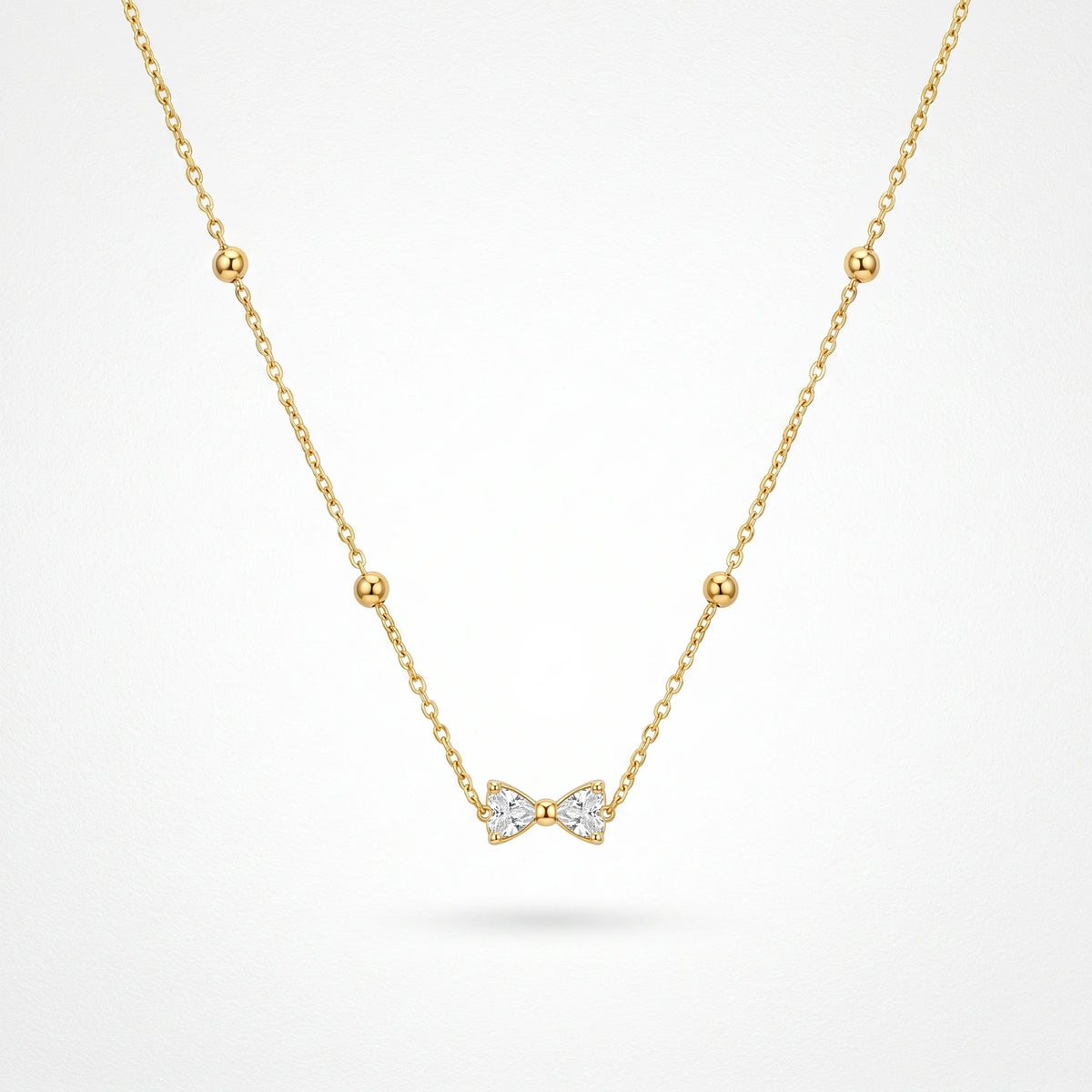 QIAOREN 13509 Dainty Crystal Bow Pendant Station Necklace with Round Beaded Thin Cable Chain, Gold Mini Bowknot CZ Necklace