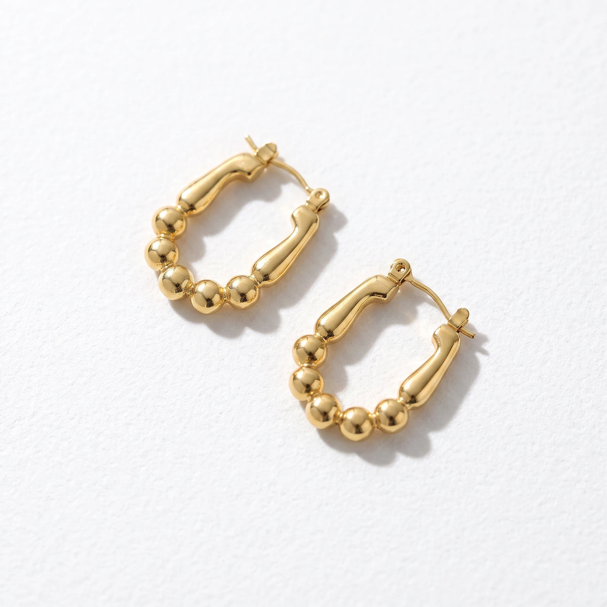 QIAOREN 13261 18K Gold PVD Plated Stainless Steel Hollow Four Pointed Polished Earring Hypoallergenic Dainty Daily Jewelry