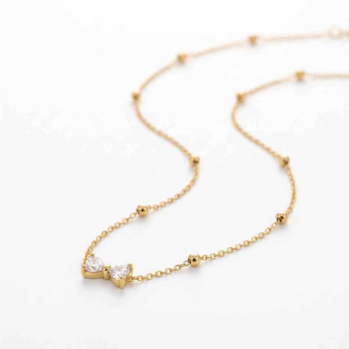 QIAOREN 13509 Dainty Crystal Bow Pendant Station Necklace with Round Beaded Thin Cable Chain, Gold Mini Bowknot CZ Necklace
