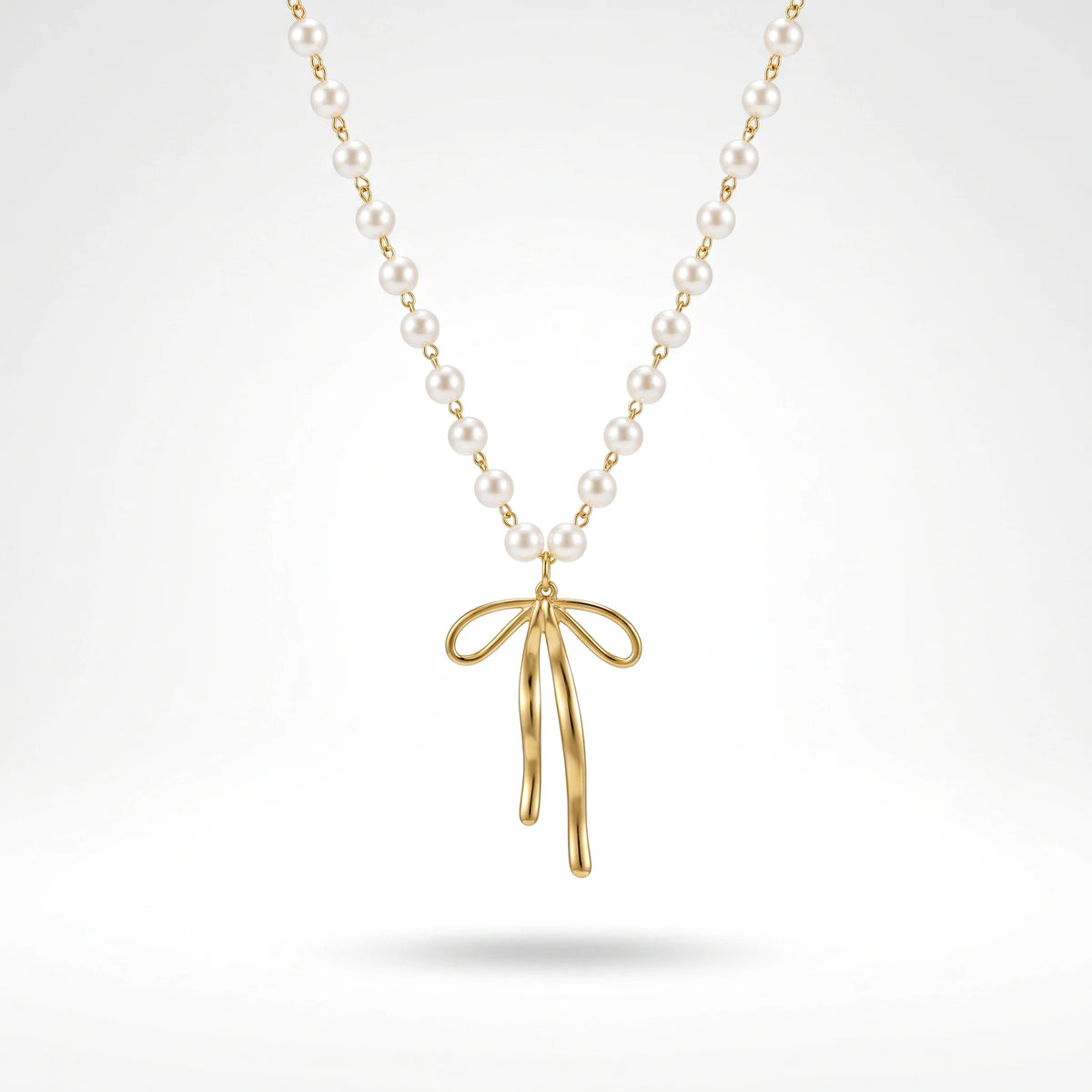 QIAOREN 11963 Wholesale 18K Gold Plated Stainless Steel Necklace Elegant Long Tail Bowknot Pendant Imitation Pearl