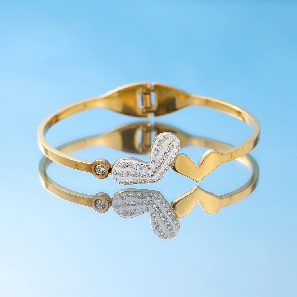 QIAOREN 13659 Spring Thin Cuff Bangle with Offset Dual Heart Charms, Paved Clear Zircon Curved Heart & Solid Plain Heart