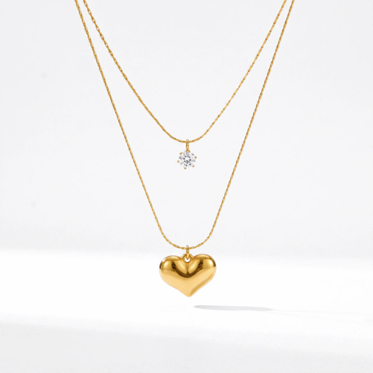 QIAOREN 13481 Dainty Double Layer Snake Chain Necklace with Tiny Round Zircon & Puffy Heart Pendants, Minimalist Layering
