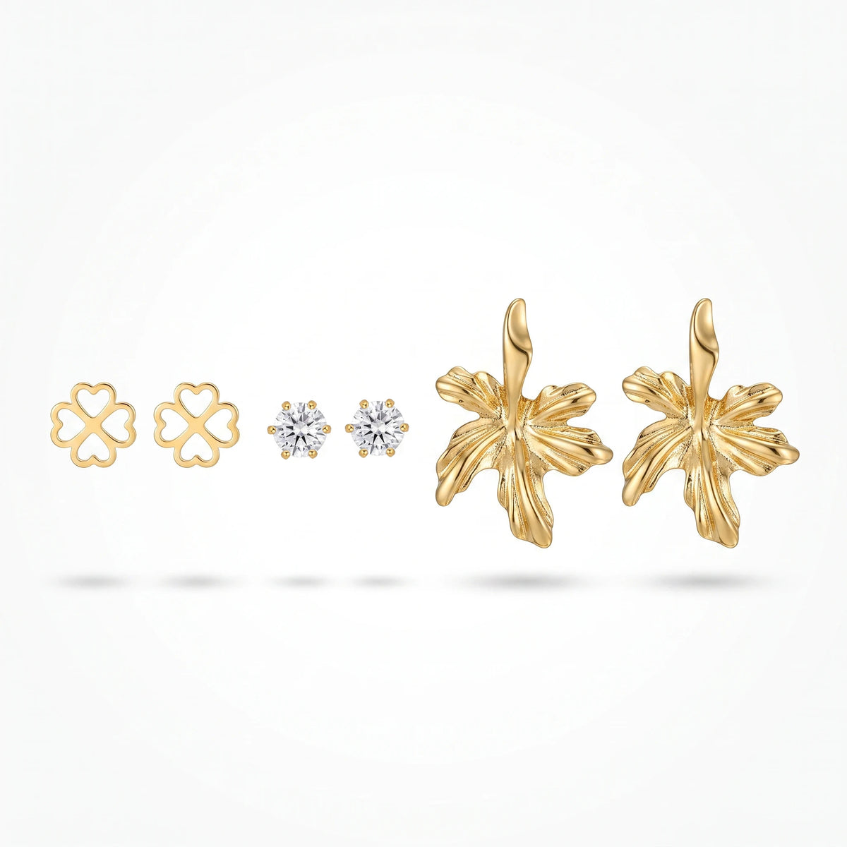 QIAOREN 13257  3 PCS Set 18K Gold Plated Stainless Steel Flower Stud Earrings Set Solid Clover, Round CZ
