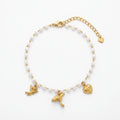 QIAOREN 13322 Tiny Pearl Anklet with Swim Ring, Flower & Lollipop Charms, Sweet Foot Jewelry Gift for Summer Casual Vibe